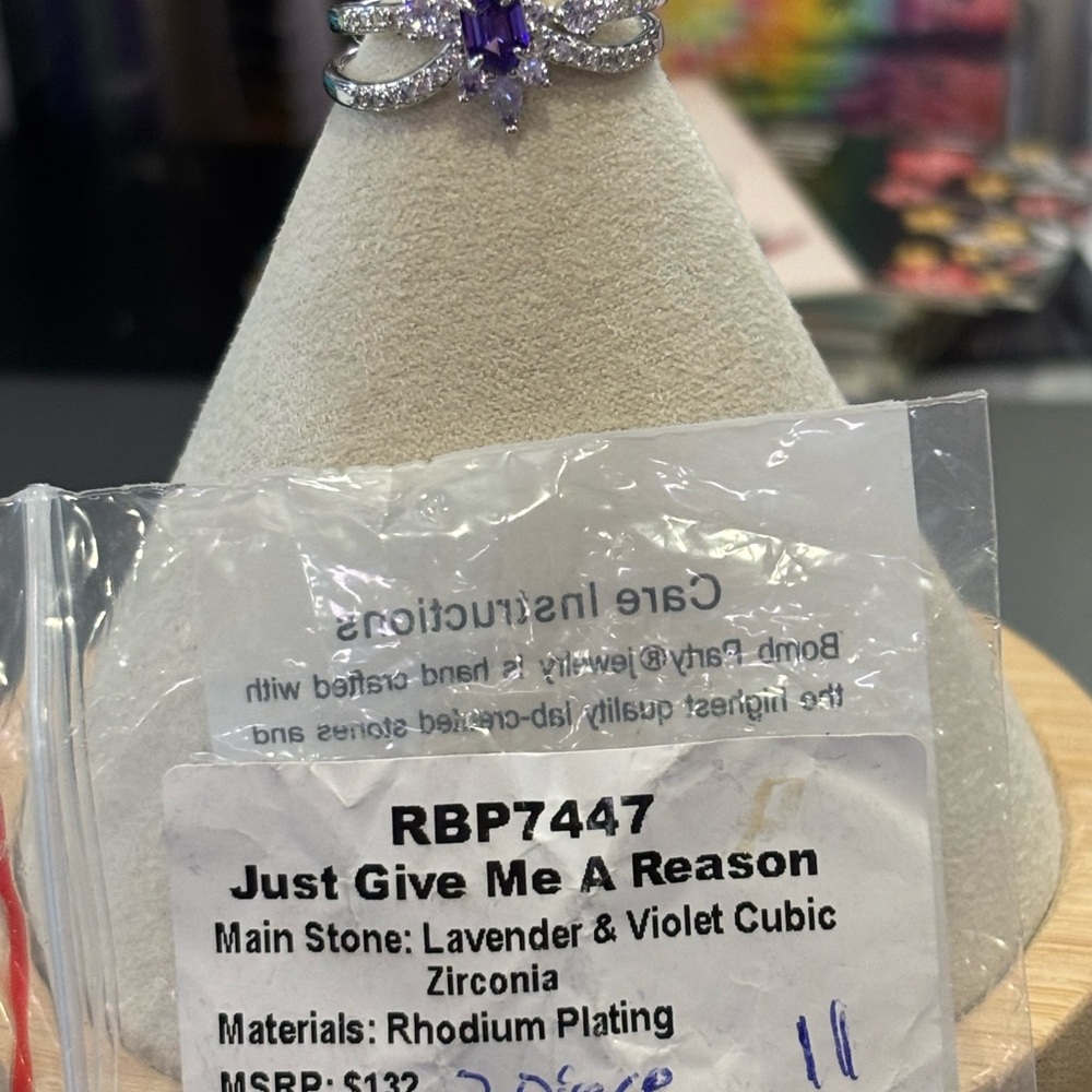 Purple Pom-Pom Accessory with Whimsical Design